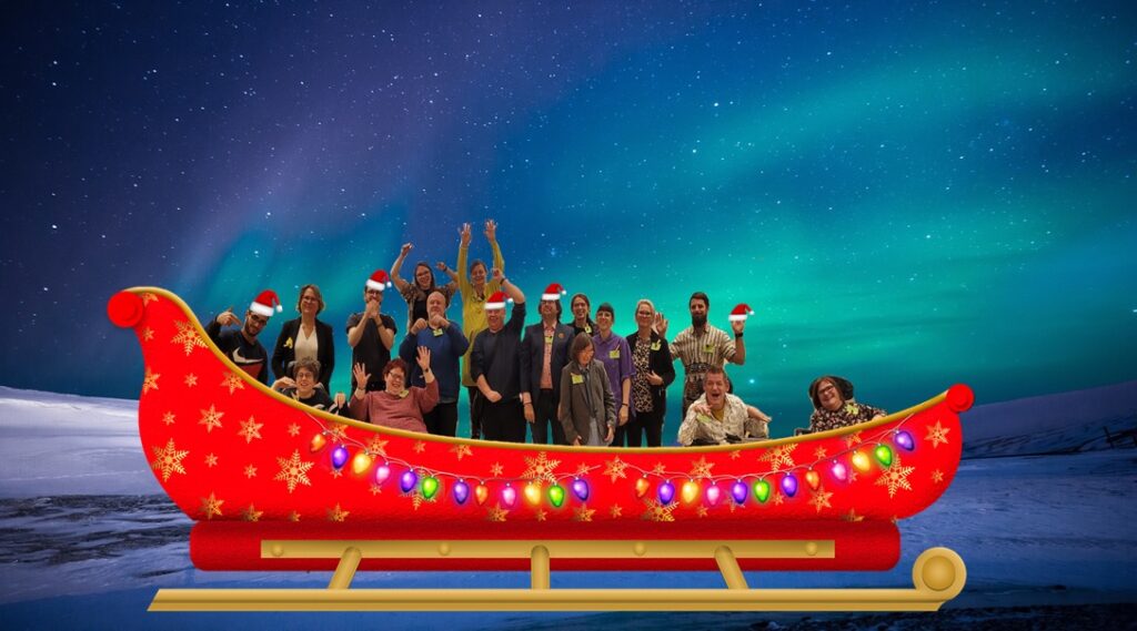 Gruppenfoto der Agentur Sonnenklar Drehscheibe Peer Streitschlichtung. Das Bild wurde bearbeitet, alle sitzen in einem großen Roten Schlitten und manche haben eine Weihnachtsmütze auf.